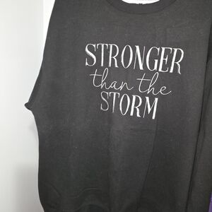 Black 'Stronger Than The Storm' Sweatshirt